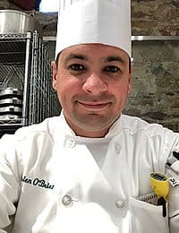 Photo of CIA student, Brien O'Brien in chef whites