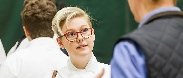 A CIA student being interviewed at a CIA career networking day on the California campus, organized by the CIA Career Services center.