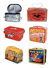 A collection of six vintage lunchboxes are displayed in two columns. They include designs featuring drum graphics, circus imagery, Cracker Jack logo, school bus theme, and a Pac-Man game graphic. The top left lunchbox is open, showing a metal interior.