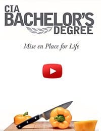 An advertisement for the CIA Bachelor's Degree with the tagline "Mise en Place for Life." It includes an image of a knife cutting a yellow bell pepper on a wooden board and a red YouTube play button icon below the text.