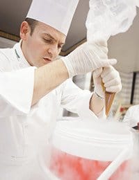 Chef Migoya leading a class in cooking with liquid nitrogen