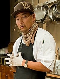 Roy Choi '98, gives a demonstration at the CIA's Worlds of Flavor Street Food conference