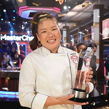 Dara Yu ’21, the youngest winner of MasterChef holding her MasterChef trophy.