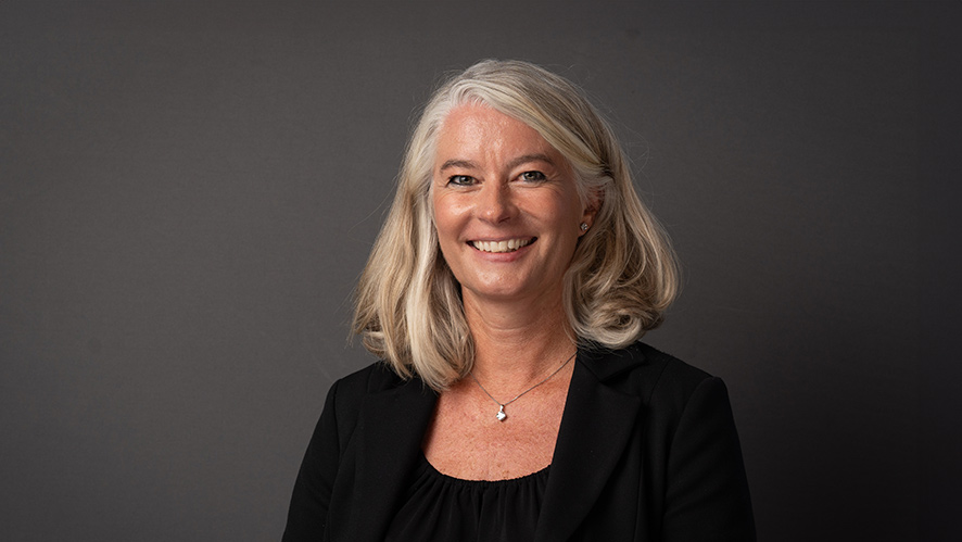 Image of a smiling Claudia Schubert who was appointed to the Culinary Institute of America’s Board of Trustees.